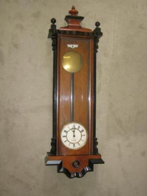 Appraisal: A VIENNA WALL CLOCK the single weight driven movement stamped