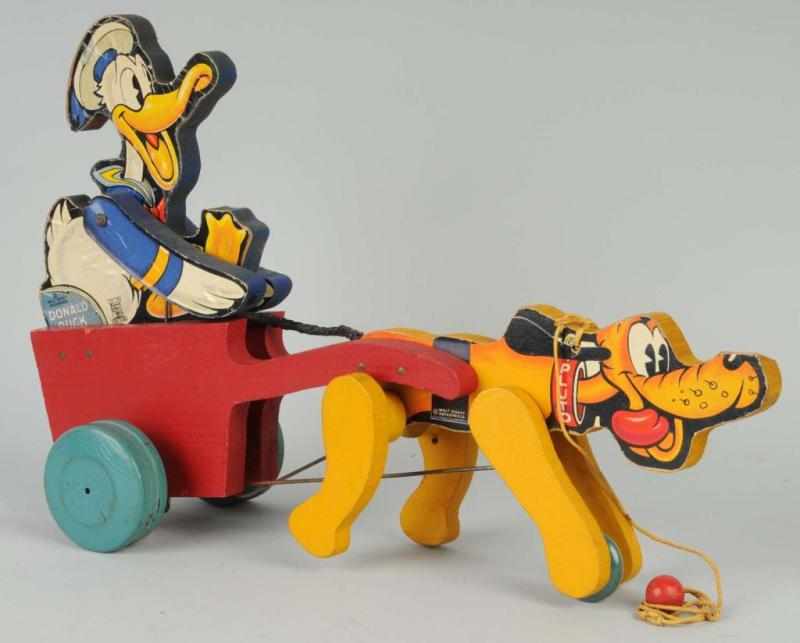 Appraisal: Fisher Price Walt Disney Dog Cart Donald Duck Toy Description