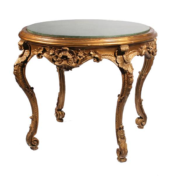 Appraisal: A Louis XV style giltwood center table with marble top