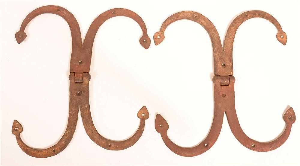 Appraisal: Wrought Iron Double Ram's Horn Hinges Pair of Late th