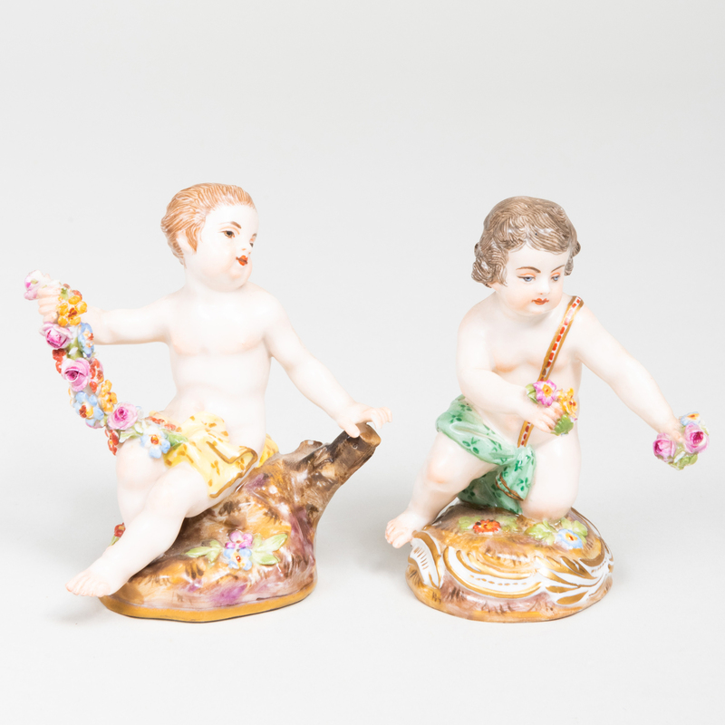 Appraisal: Pair of Meissen Porcelain Figures of Putti with Garland Blue