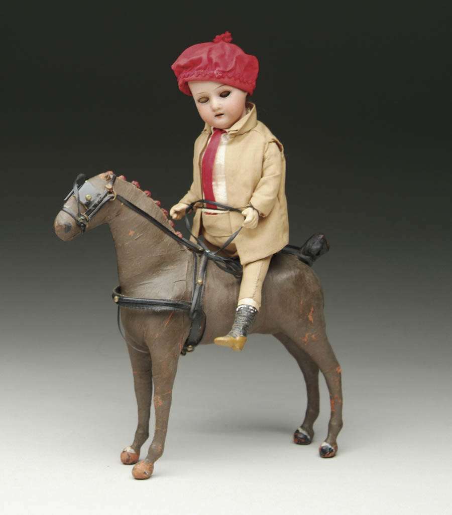 Appraisal: JOCKEY ON HORSEBACK DOLL Doll - cm bisque head boy