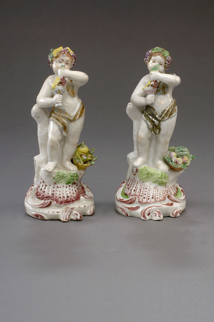 Appraisal: TWO PLYMOUTH PORCELAIN FIGURES OF PUTTI ALLEGORICAL OF 'AUTUMN '