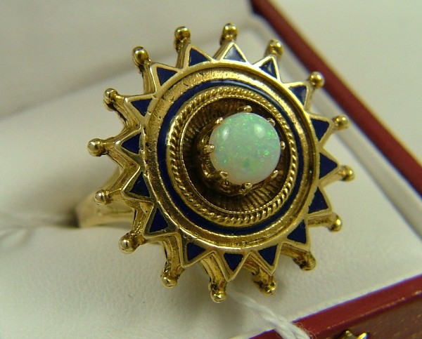 Appraisal: OPAL AND BLUE ENAMEL SOLITAIRE RING K yellow gold setting