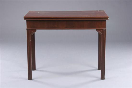 Appraisal: GEORGE III STYLE FLIP-TOP GAMES TABLE th century mahogany with