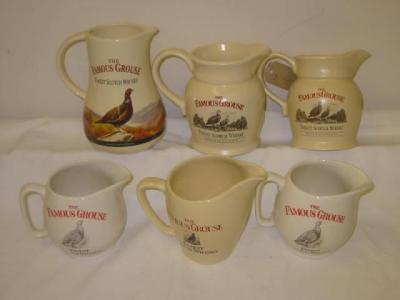 Appraisal: Six Famous Grouse jugs in cream by Castle Ceramics and