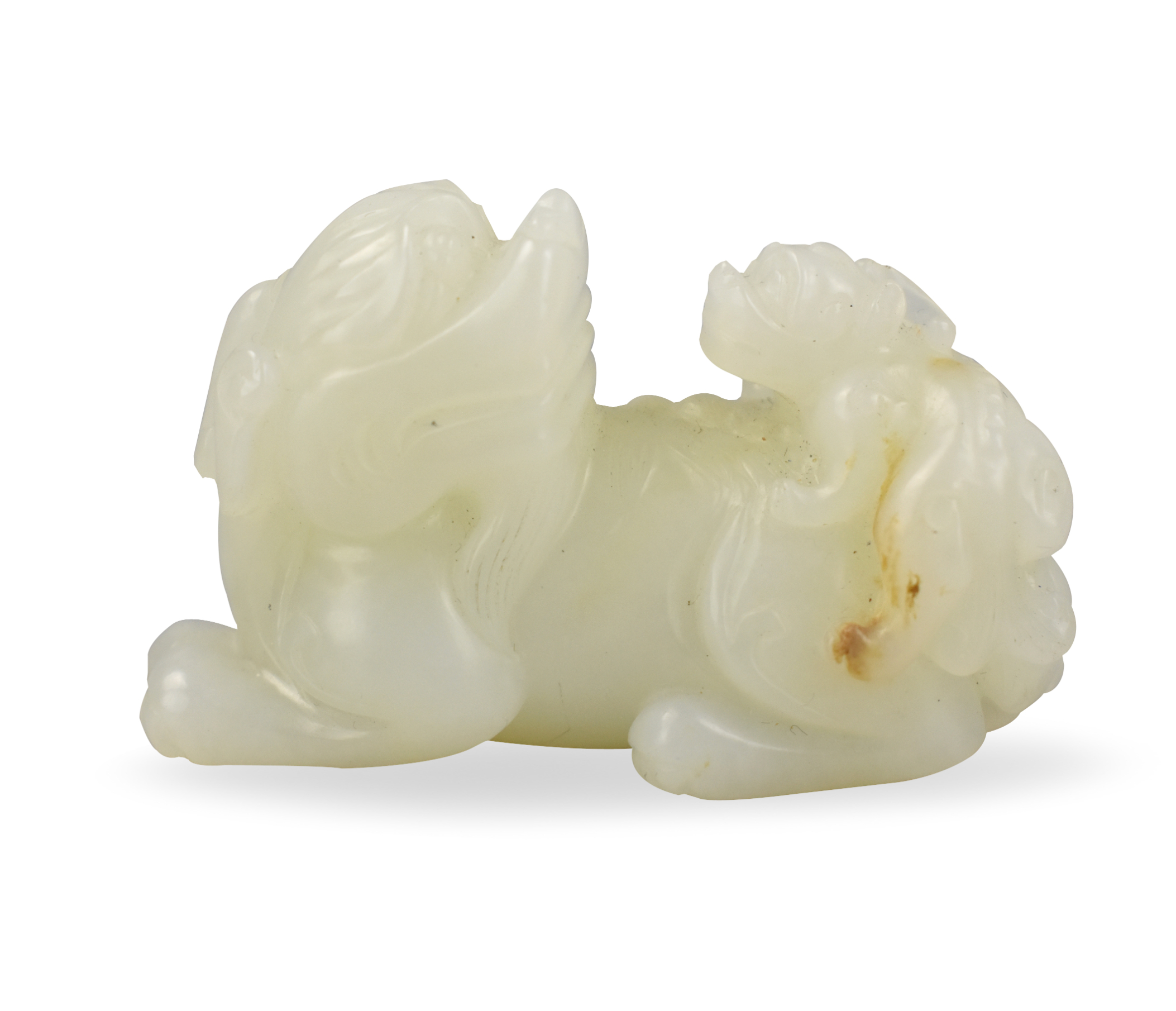 Appraisal: A Chinese hetian white jade carved beast The beast resembling