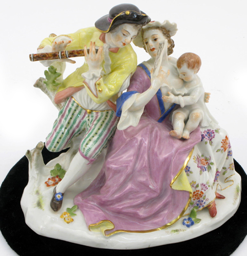 Appraisal: A MEISSEN PORCELAIN FIGURAL GROUP hand painted of a gentleman