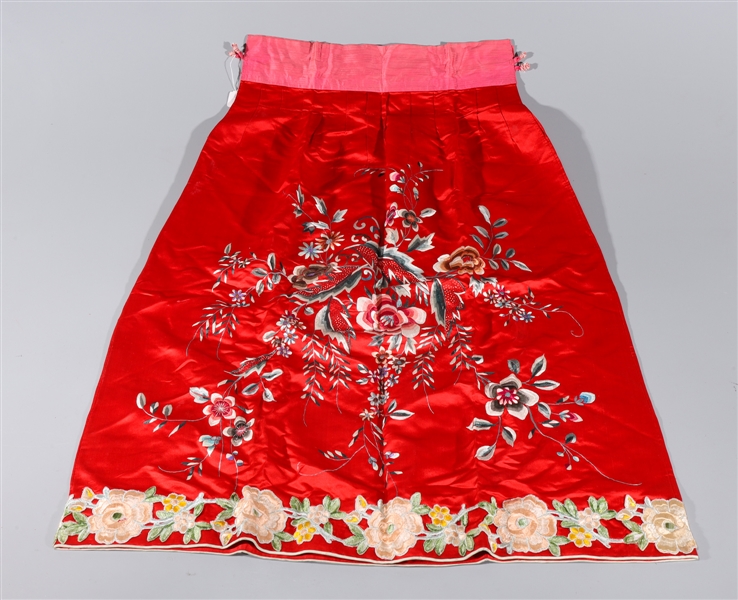 Appraisal: Chinese red silk skirt embroidered with flowers overall good condition