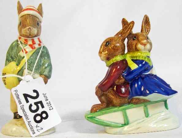 Appraisal: Royal Doulton Bunnykins Figures Paperboy DB and Sleigh Ride DB