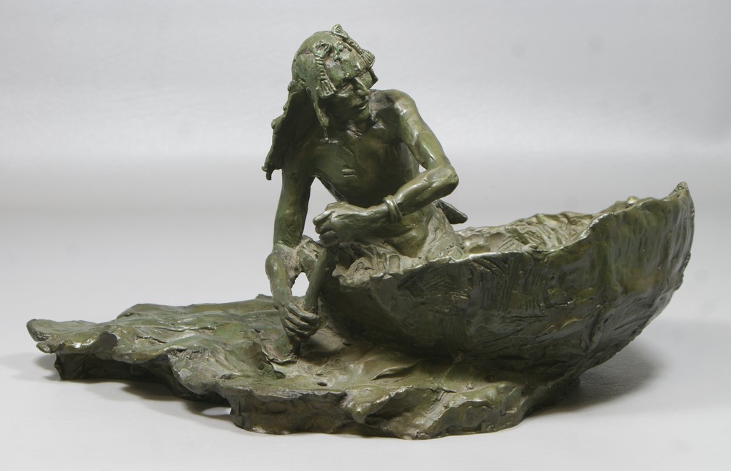 Appraisal: Dave Powell Bronze of an Indian paddling signed Dave Powell