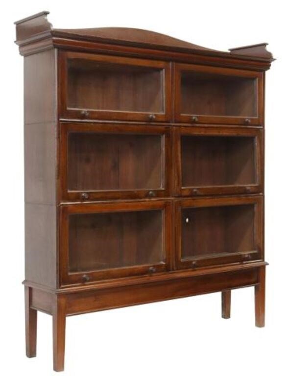 Appraisal: English mahogany barrister bookcase early th c having curved crest