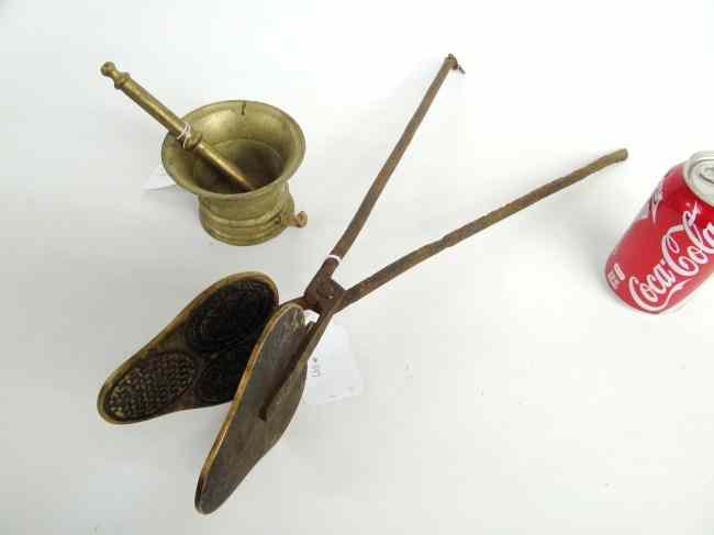 Appraisal: Brass mortar and pestle along with wafer iron