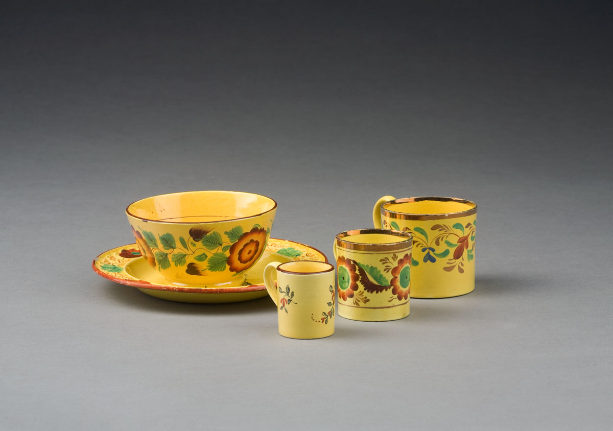 Appraisal: FIVE ENGLISH YELLOW-GLAZED TRANSFER-PRINTED AND ENAMELED WARES CIRCA - Comprising