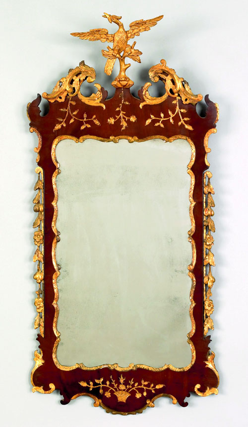 Appraisal: Georgian mahogany and parcel gilt looking glass ca with a