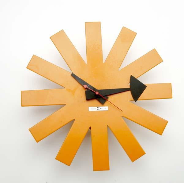 Appraisal: GEORGE NELSON HOWARD MILLER Asterisk Clock with orange enameled metal