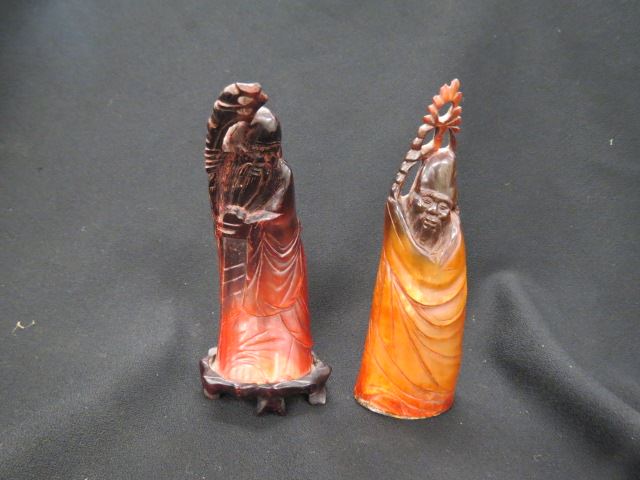 Appraisal: Chinese Carved Horn Figurines one on wood base