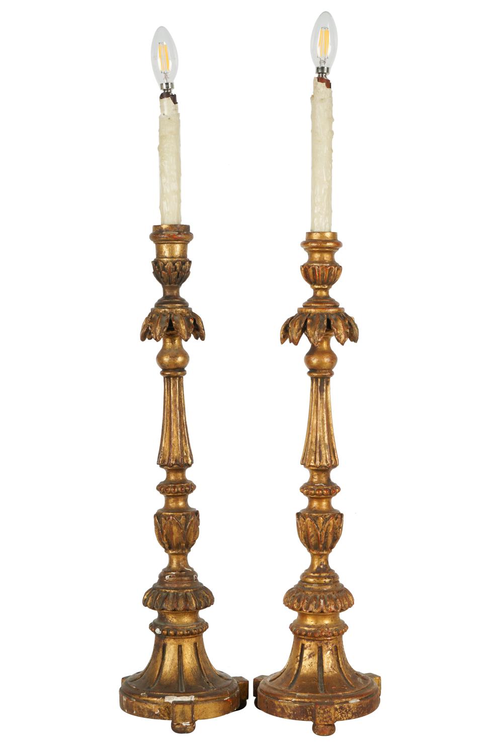 Appraisal: PAIR OF NEOCLASSICAL-STYLE GILTWOOD TABLE LAMPSeach candlestick with faux wax