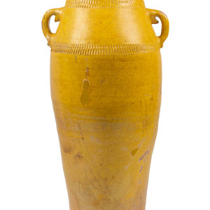 Appraisal: An Ochre-Glazed Pottery Jar Height x diameter inches Property from