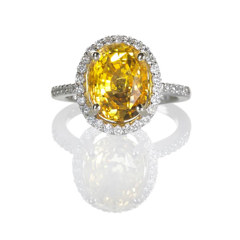 Appraisal: GOLDEN YELLOW SAPPHIRE AND DIAMOND K WG RING Condition Report