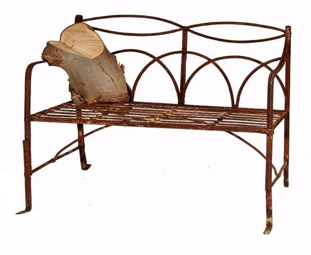 Appraisal: A REGENCY PAINTED IRON GARDEN SEAT with slat base hoop