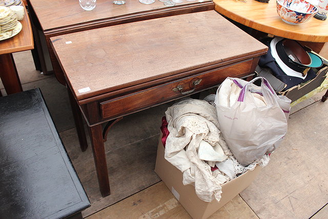 Appraisal: A GEORGIAN MAHOGANY RECTANGULAR FOLD OVER TEA TABLE with single