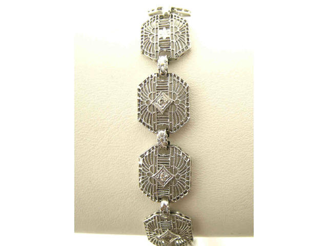 Appraisal: Vintage K white gold diamond amp filigree bracelet containing five