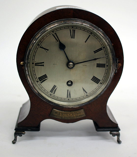 Appraisal: A MAHOGANY CASED MANTLE TIMEPIECE OR CLOCK circular silvered dial