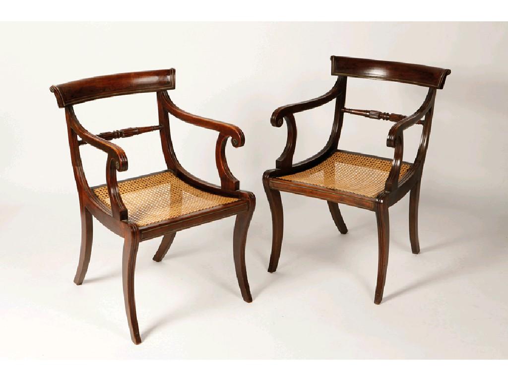 Appraisal: A PAIR OF REGENCY ROSEWOOD EFFECT AND BRASS INLAID ARMCHAIRS