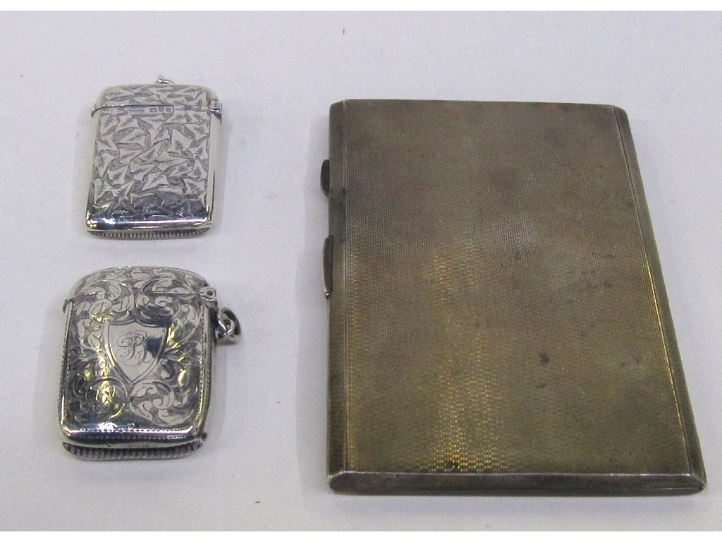 Appraisal: Lot comprising silver cigarette case and two silver vestas assorted