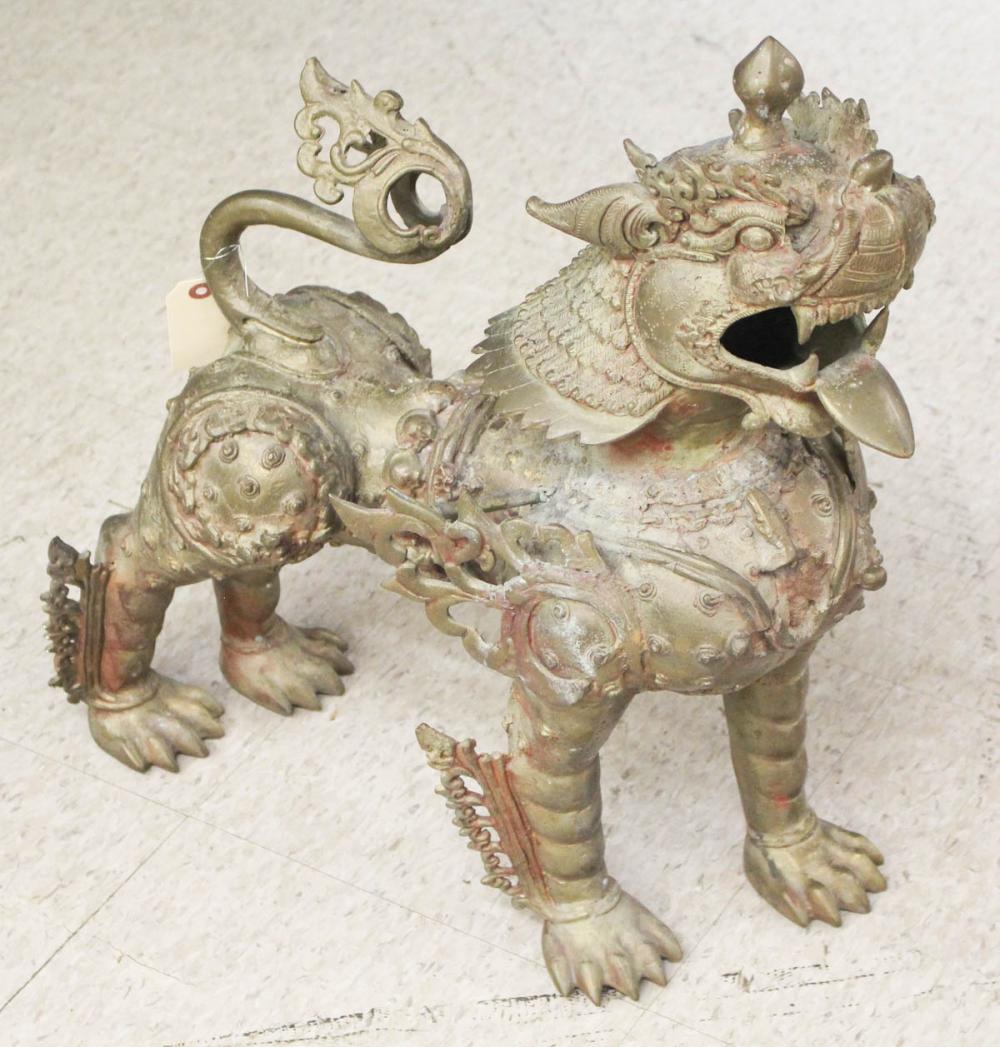 Appraisal: CHINESE ARCHAIC STYLE BRONZE FOO LION cast in standing pose