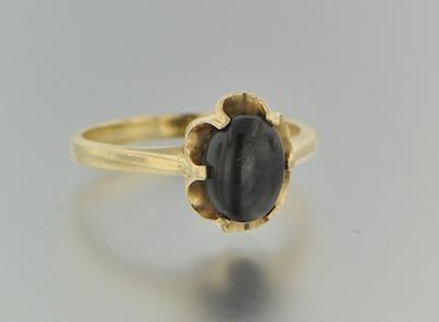 Appraisal: Ladies' Black Star Sapphire Ring A k yellow gold ring