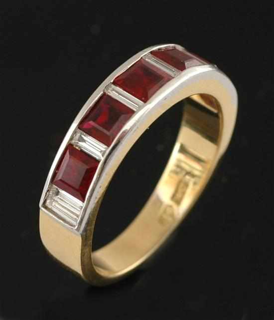 Appraisal: A ruby and diamond dress ring Channel set with five