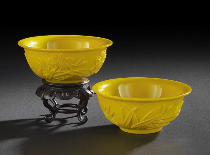 Appraisal: Pair of Chinese Carved Peking Glass Bowls each of mustard