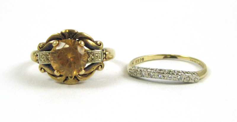 Appraisal: TWO FOURTEEN KARAT YELLOW GOLD RINGS including a size yellow