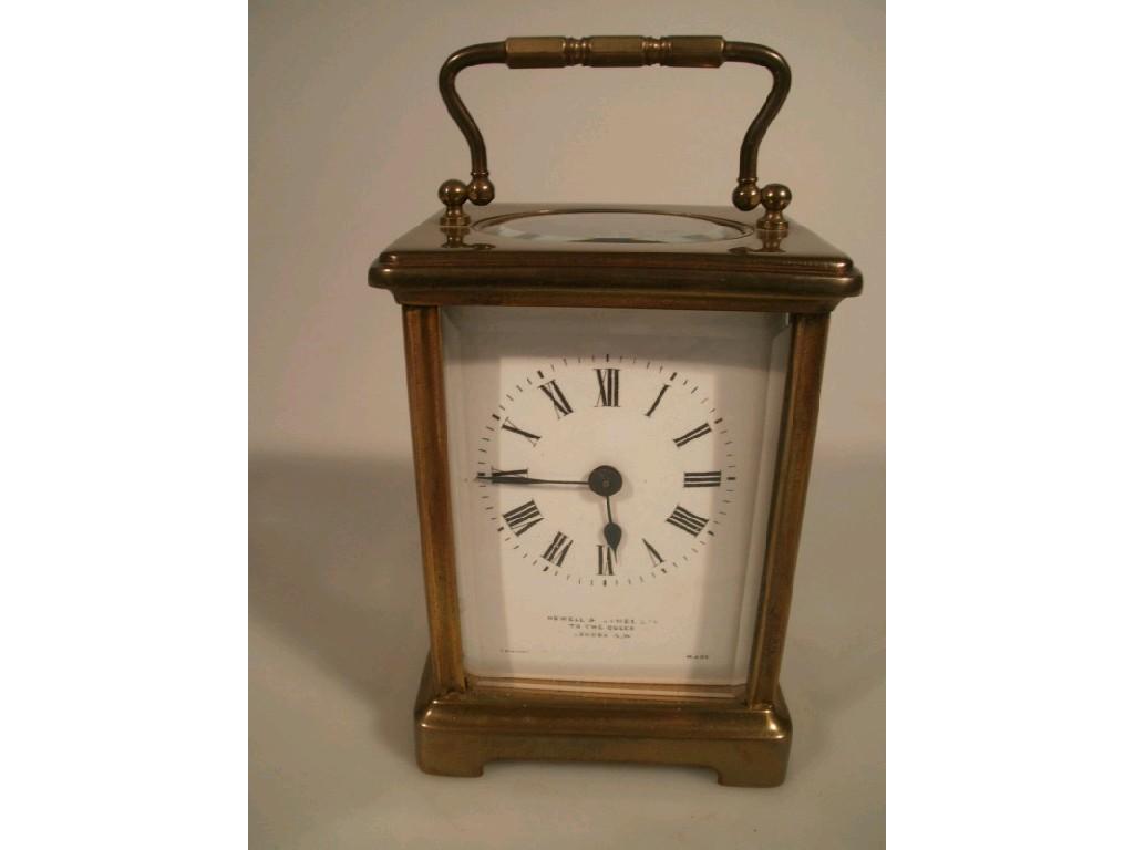 Appraisal: Brass cased carriage clock with white enamel dial and Roman