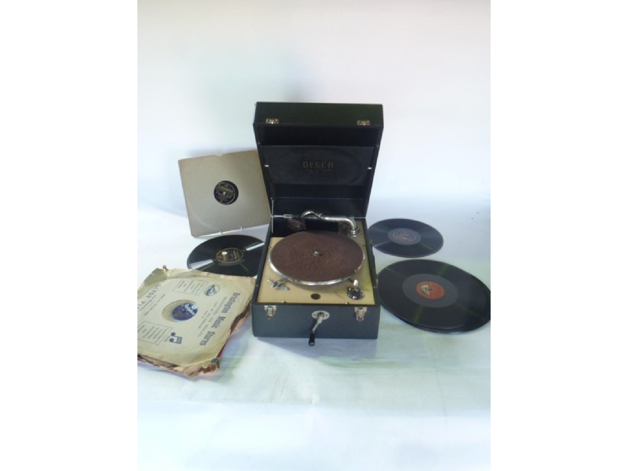 Appraisal: A Decca cased table top gramophone together with a selection