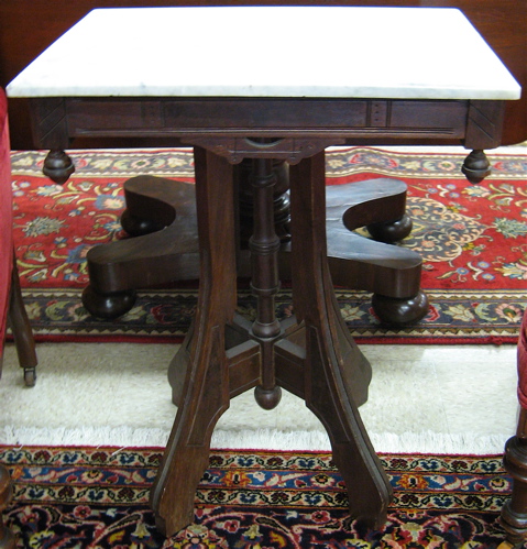 Appraisal: A VICTORIAN MARBLE-TOP LAMPSTAND Eastlake influence American c having a