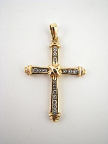 Appraisal: K yellow gold diamond cross pendant with approximately sixteen round