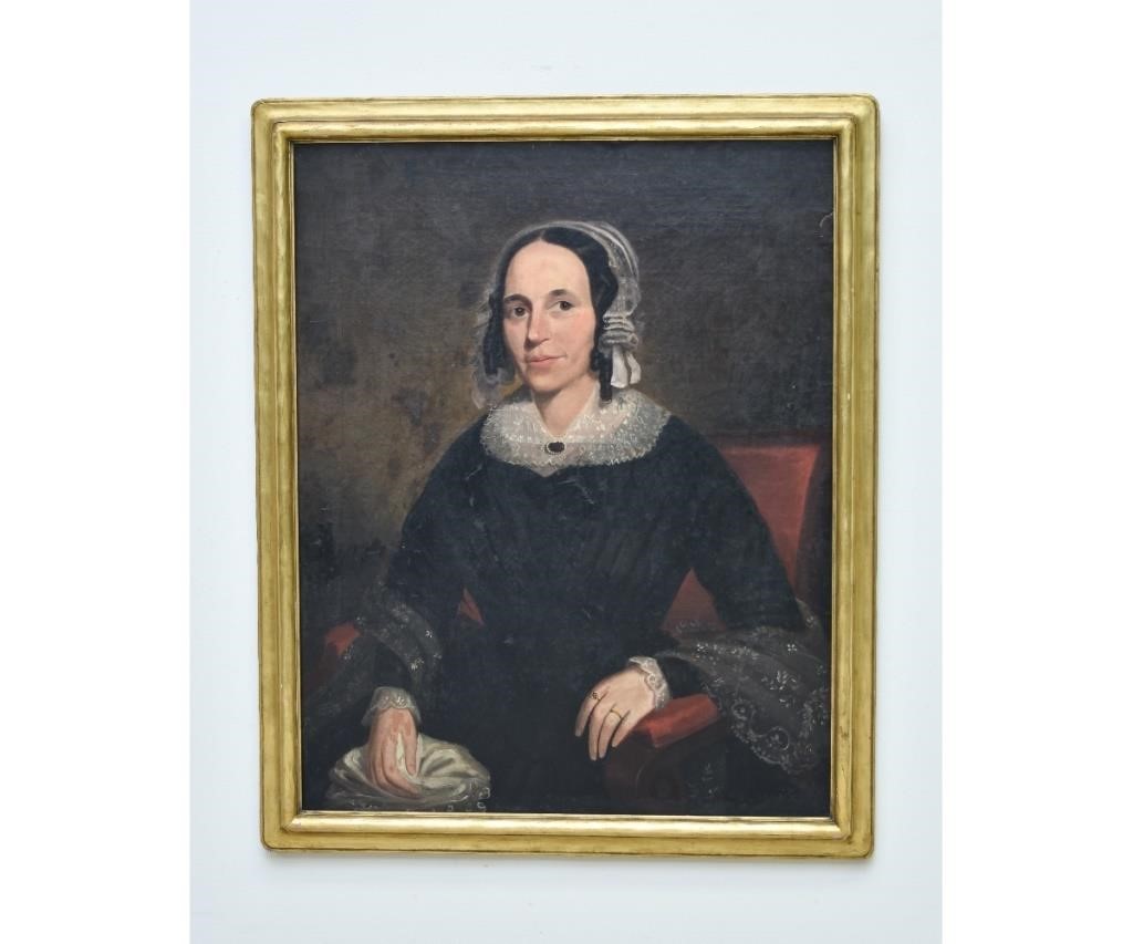 Appraisal: Oil on canvas portrait of a seated woman wearing a