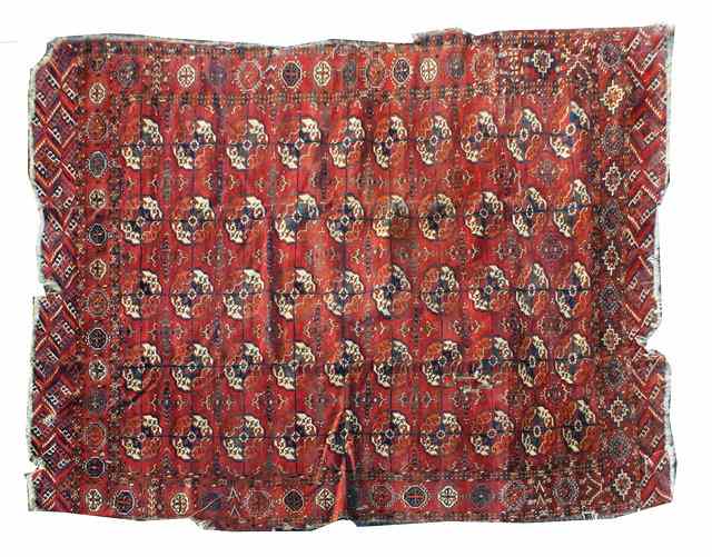 Appraisal: A TURKOMAN MAIN CARPET decorated five rows of guls on