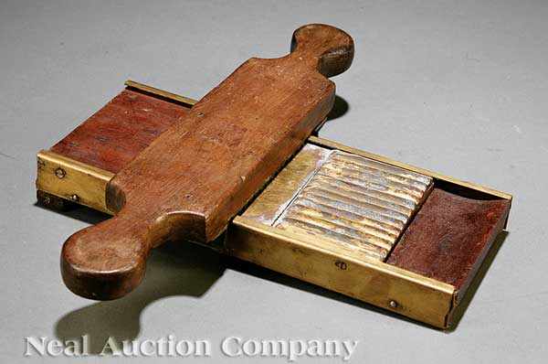 Appraisal: An English Apothecary Pill Roller Counter c mahogany and brass