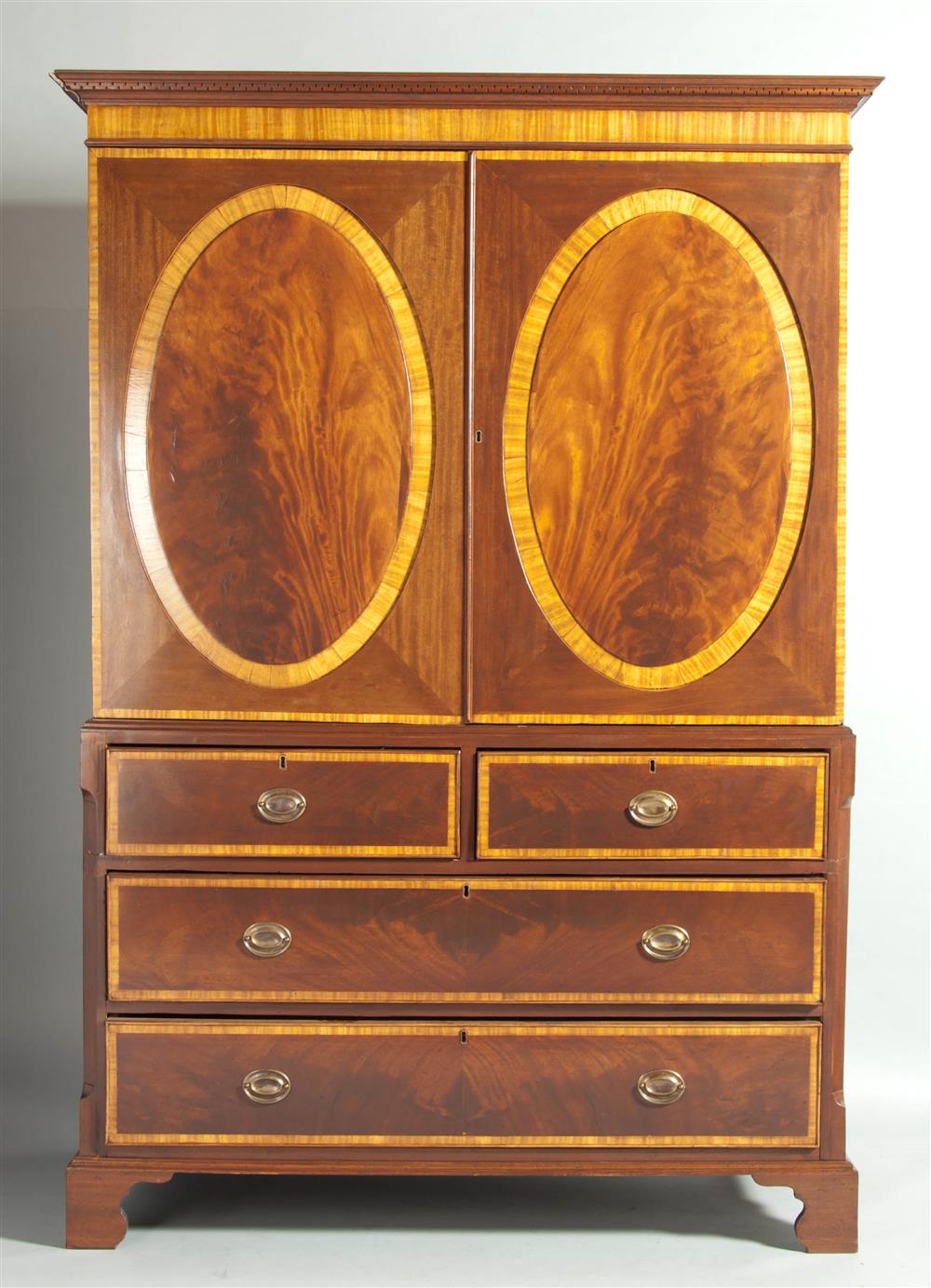 Appraisal: GEORGE III STYLE SATINWOOD BANDED MAHOGANY BOOKCASE CABINET in two