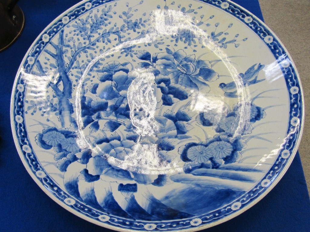 Appraisal: Large blue and white oriental charger florally decorated with prunus