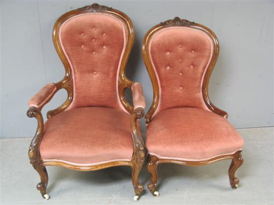 Appraisal: th Century walnut framed button back armchair with carved scroll