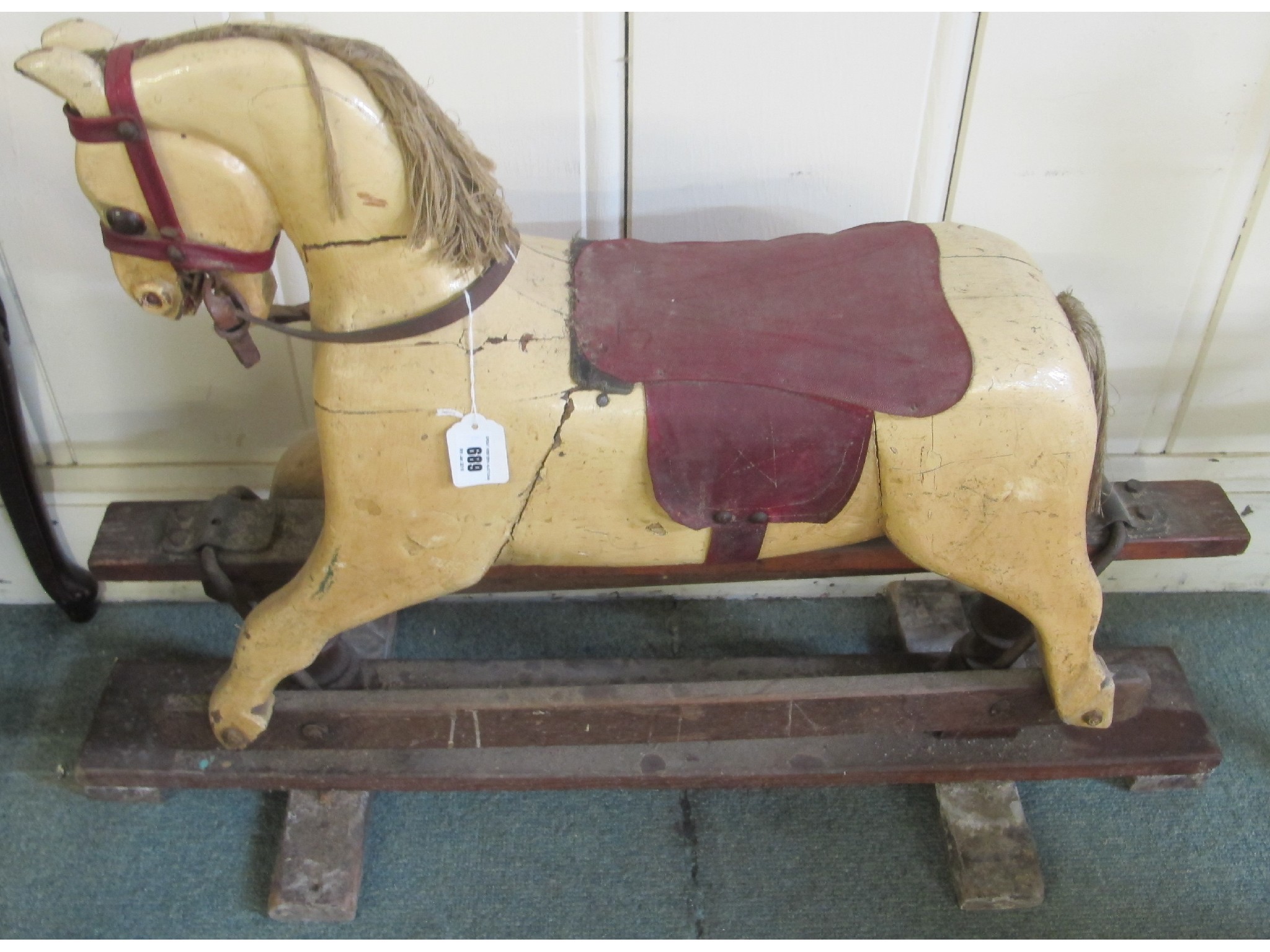 Appraisal: A late Victorian painted rocking horse on pine stand