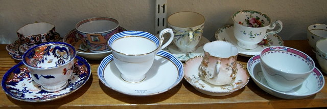 Appraisal: A collection of eight English porcelain cups tea bowls and