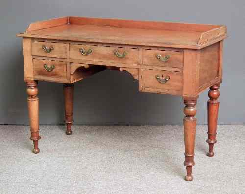 Appraisal: A Victorian mahogany tray top washstand fitted five drawers on