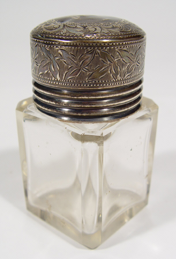 Appraisal: Edwardian square cut glass bottle and stopper with silver screw