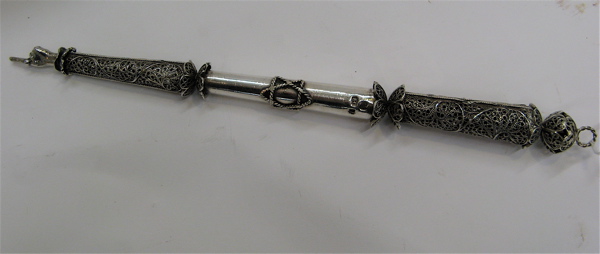 Appraisal: A RUSSIAN SILVER TORAH PAGE MARKER filigreed with one end